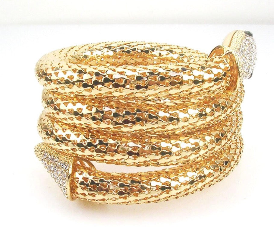 1990s vintage Kenneth J Ln. stretch metal snake bracelet with clear rhinestone head and tail and green rhinestone eyes