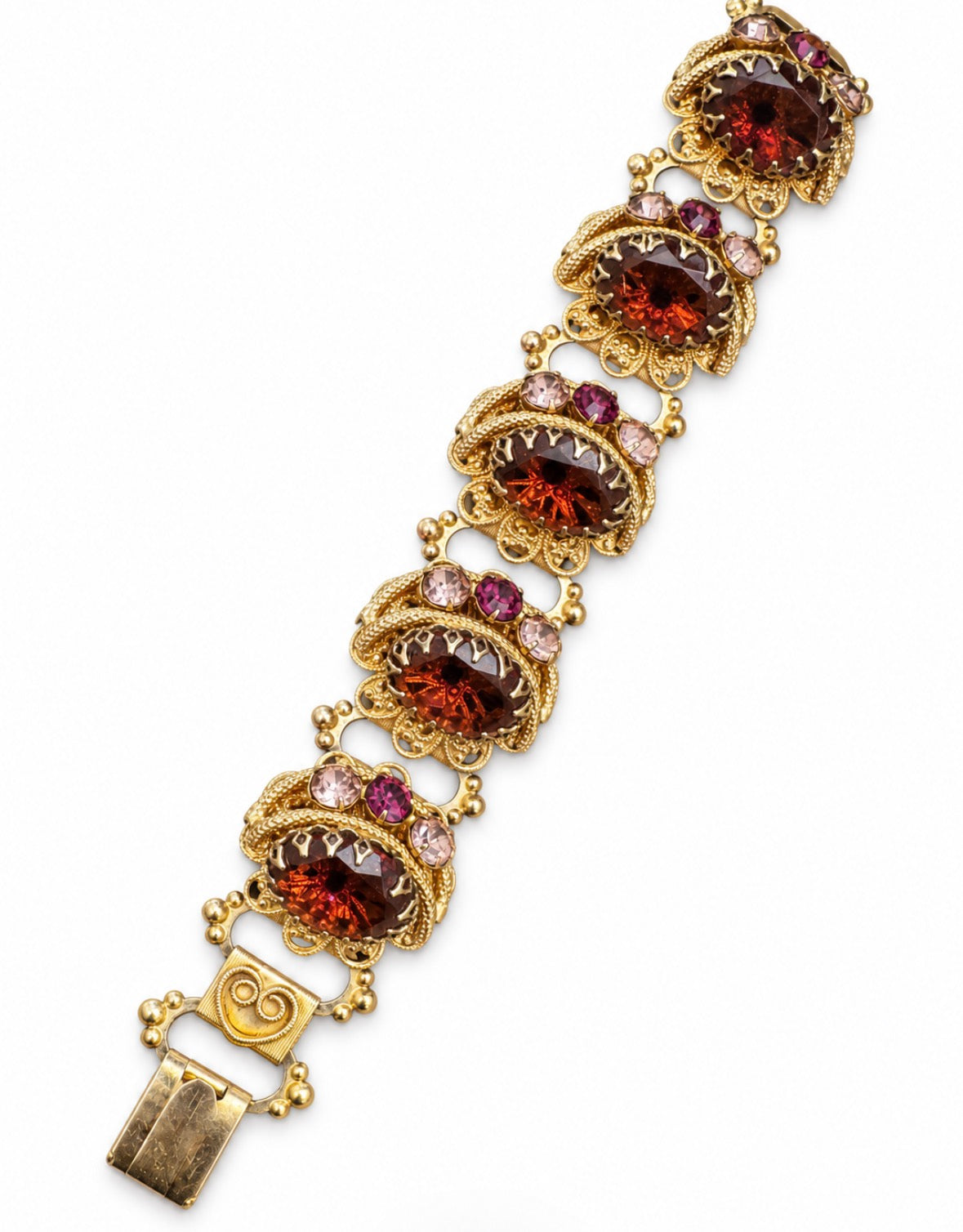 Beautifully crafted 1940s "book chain" individually prong set rhinestone bracelet with light amber and amethyst stones