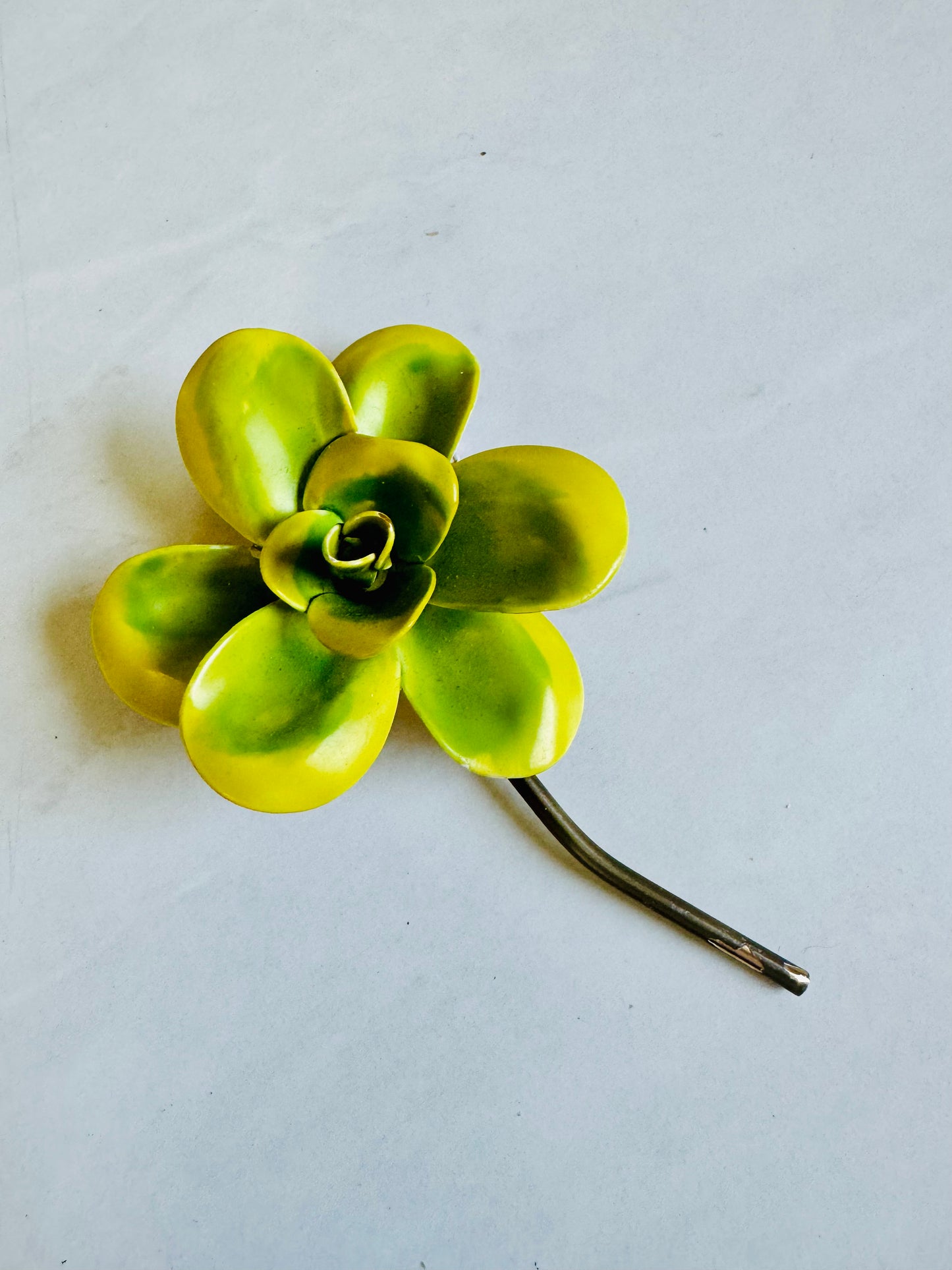 Green flower brooch with stem