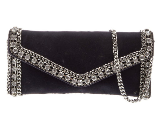 Judith Leiber Dark Blue Velvet clutch with crystal and chain embellishment. Silver tone hardware