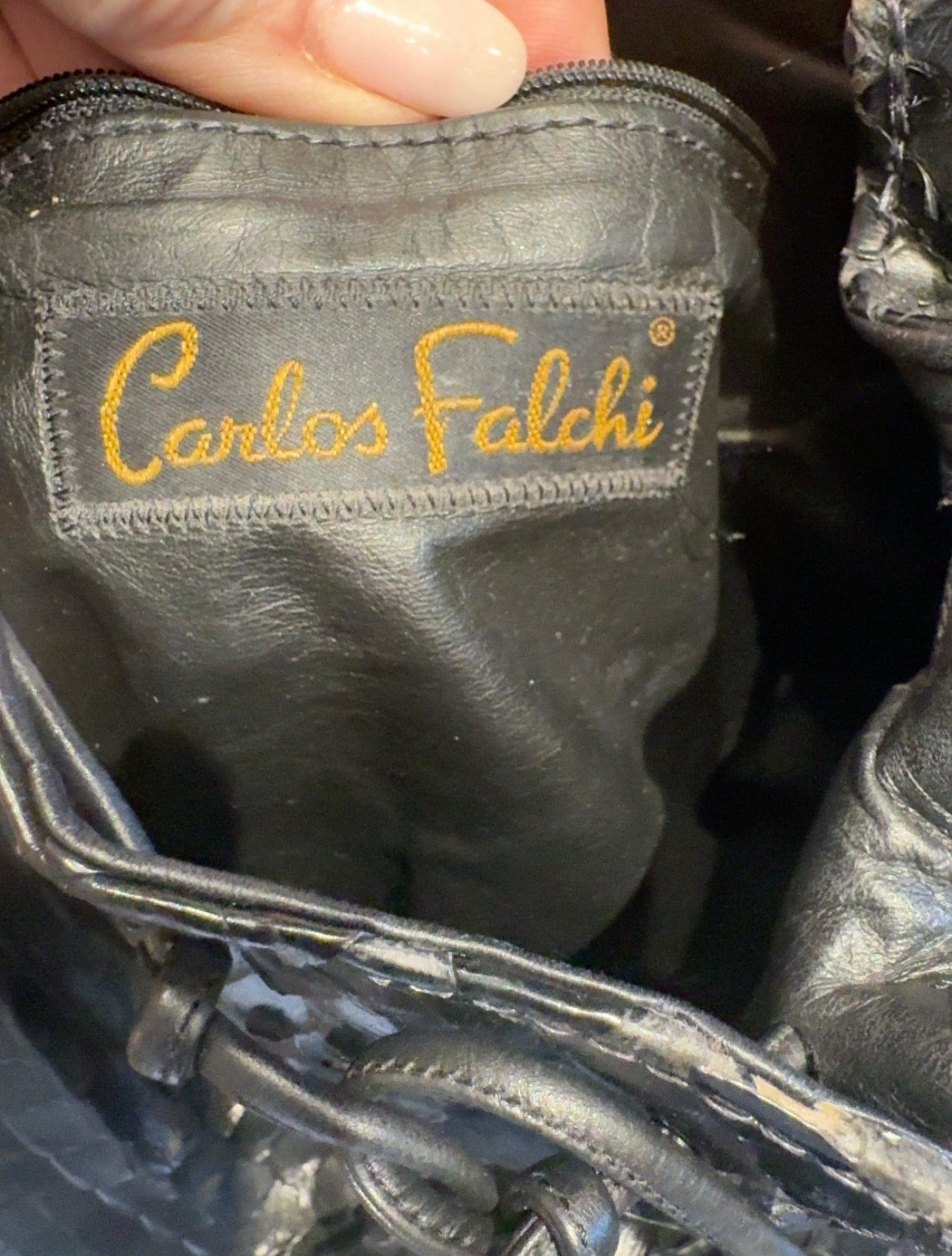 1980s black leather skin Carlos Falchi butterfly bag with extra long strap. The idea is you knot the strap to make it the desired length.