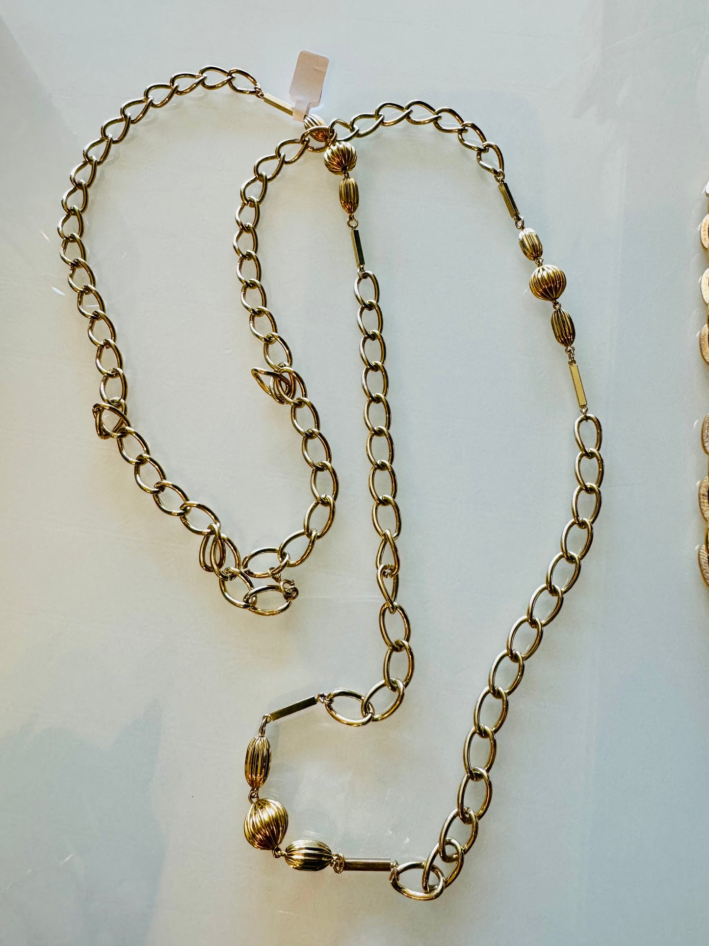 Great vintage layering chain. Or use it to convert your clutch into a chic shoulder bag