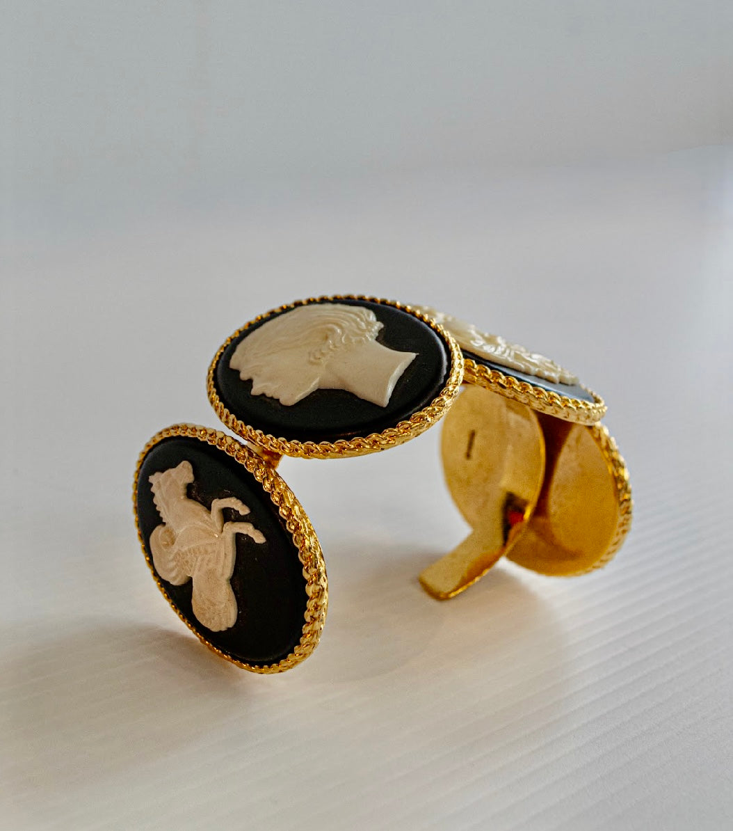 Chanel 1990s carved cameo motif large cuff bracelet with 4-cameo 2" cameo plates featuring a horse, 2 Coco portraits and a renaissance girl.