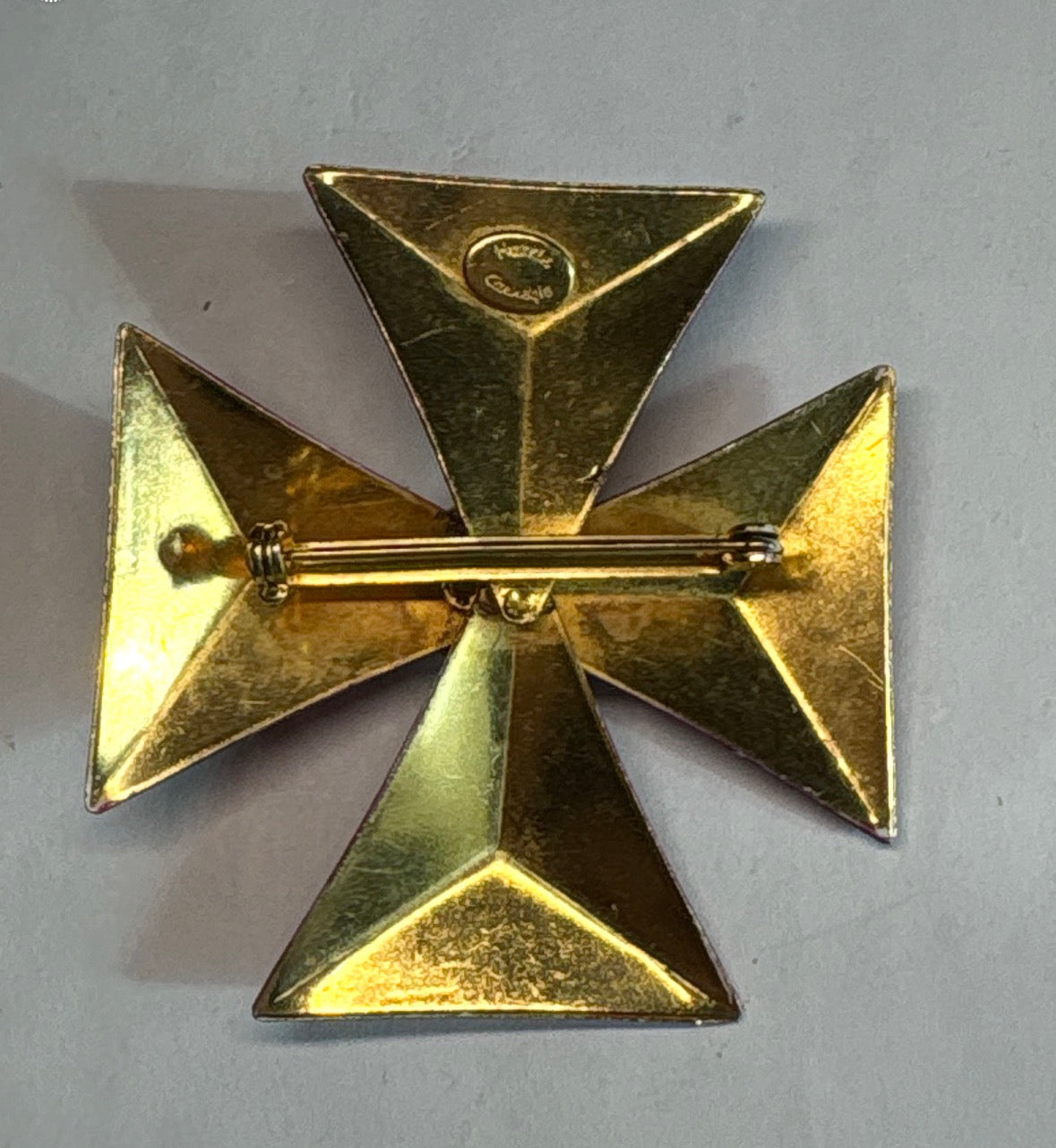 1960’s Hattie Carnegie Maltese Cross metal and enamel brooch.