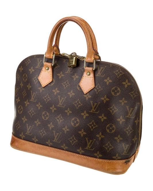 Louis Vuitton Monogram ALMA bag from 1998 in coated canvas and leather. Includes lock. See photos for wear.