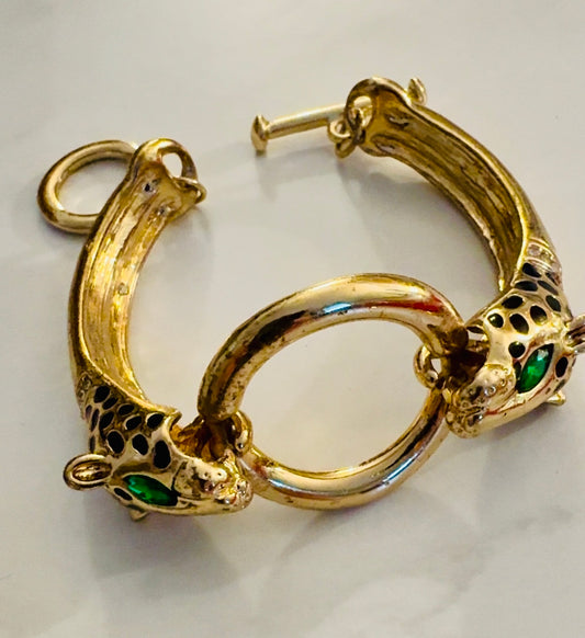 Vintage gold tone leopard with green rhinestone eyes toggle clasp bracelet