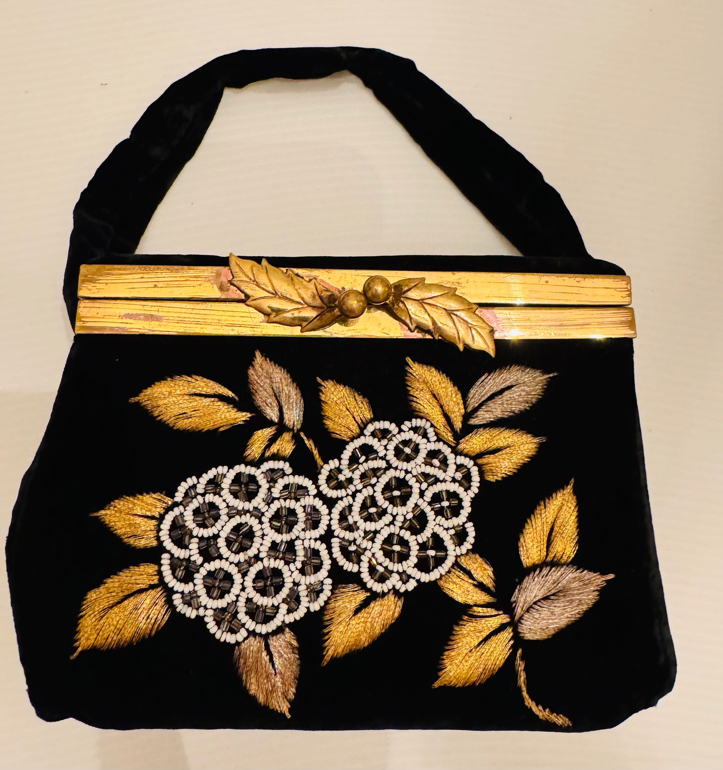 Vintage 1940s black velvet handmade box bag with beaded flowers and gold tone kiss lock hardware