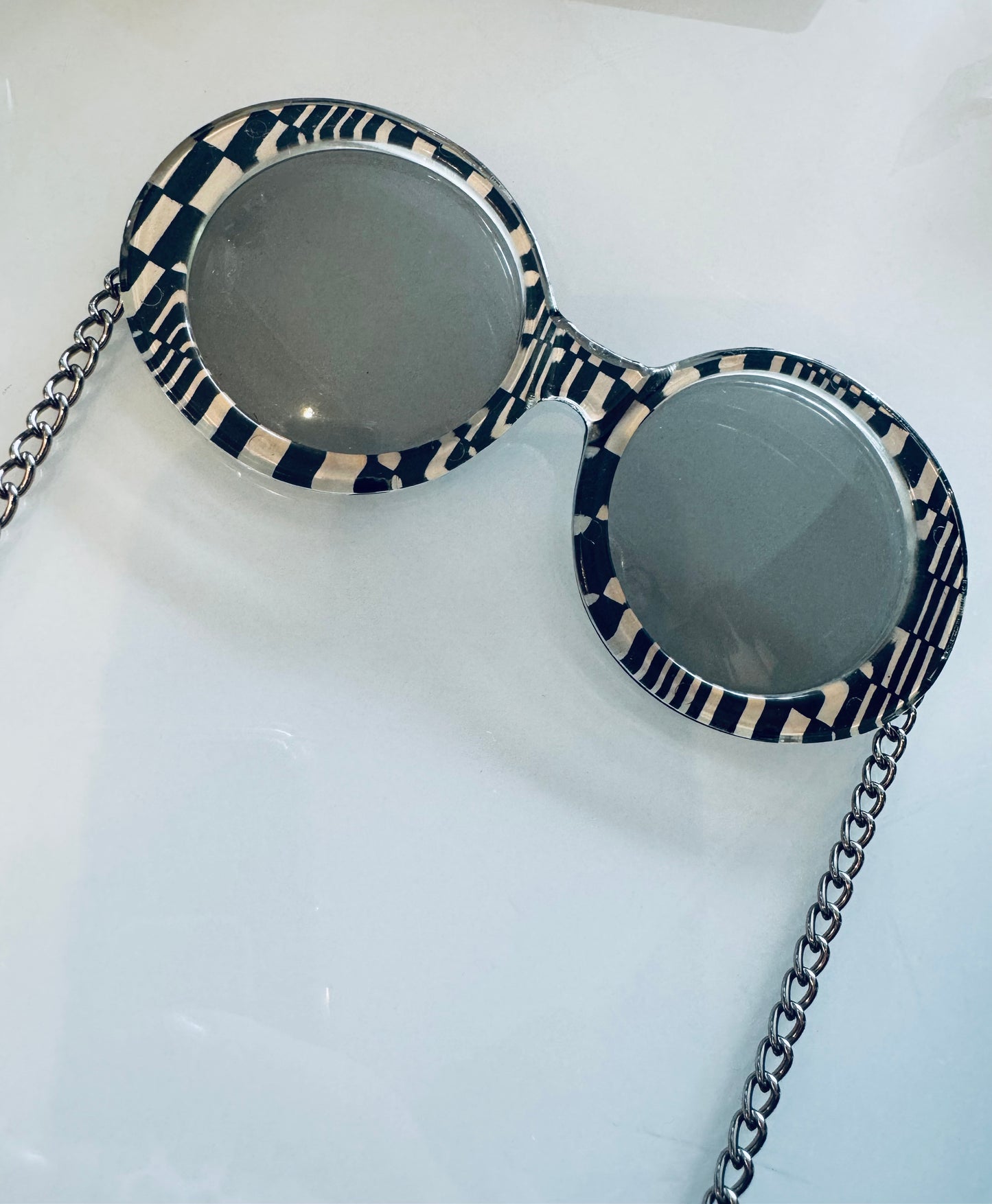 1960s je dol sunglasses with wrap around the ear chain and hanging groovy disks