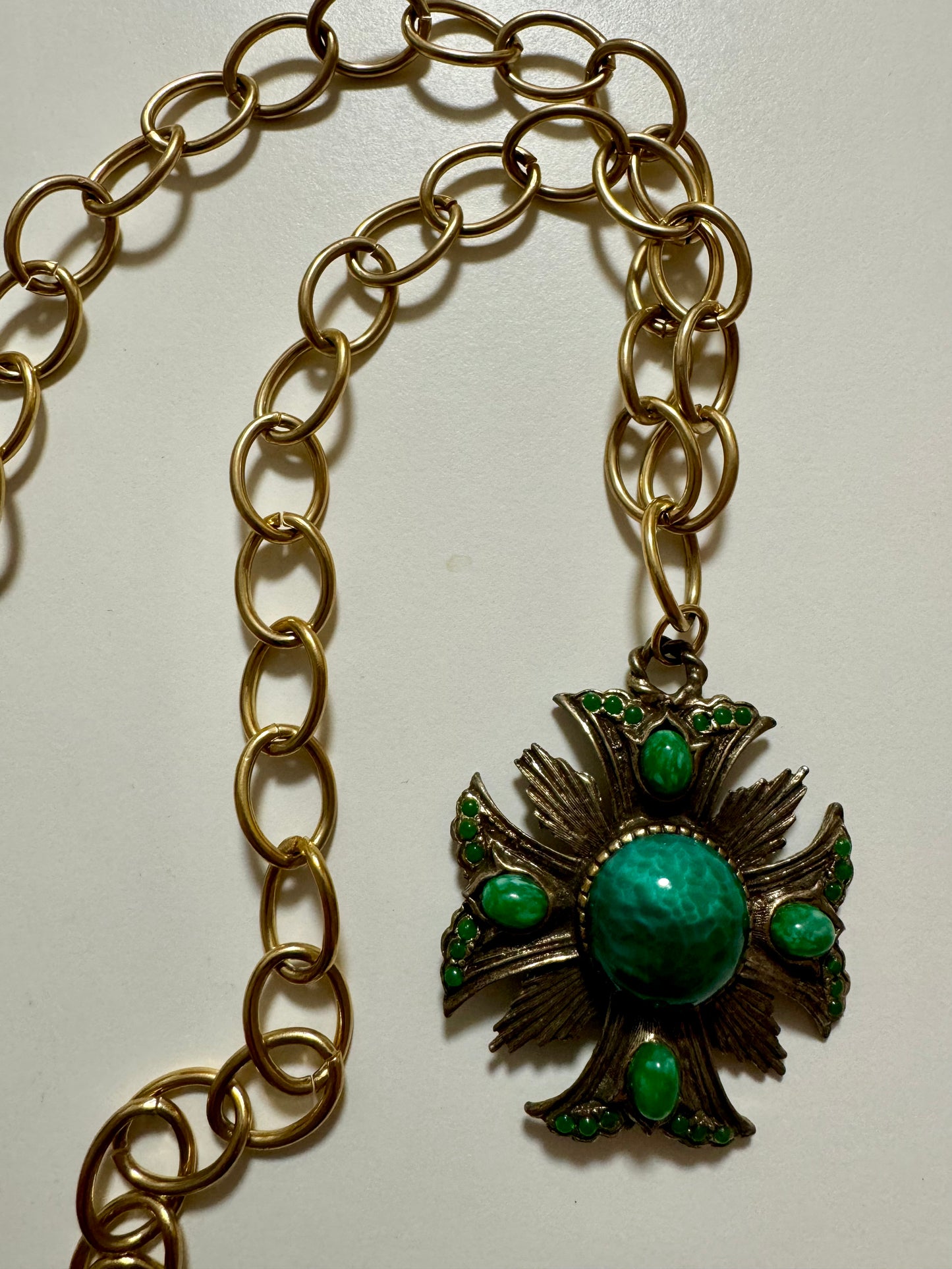 Gold tone green stone and rhinestone pendant necklace