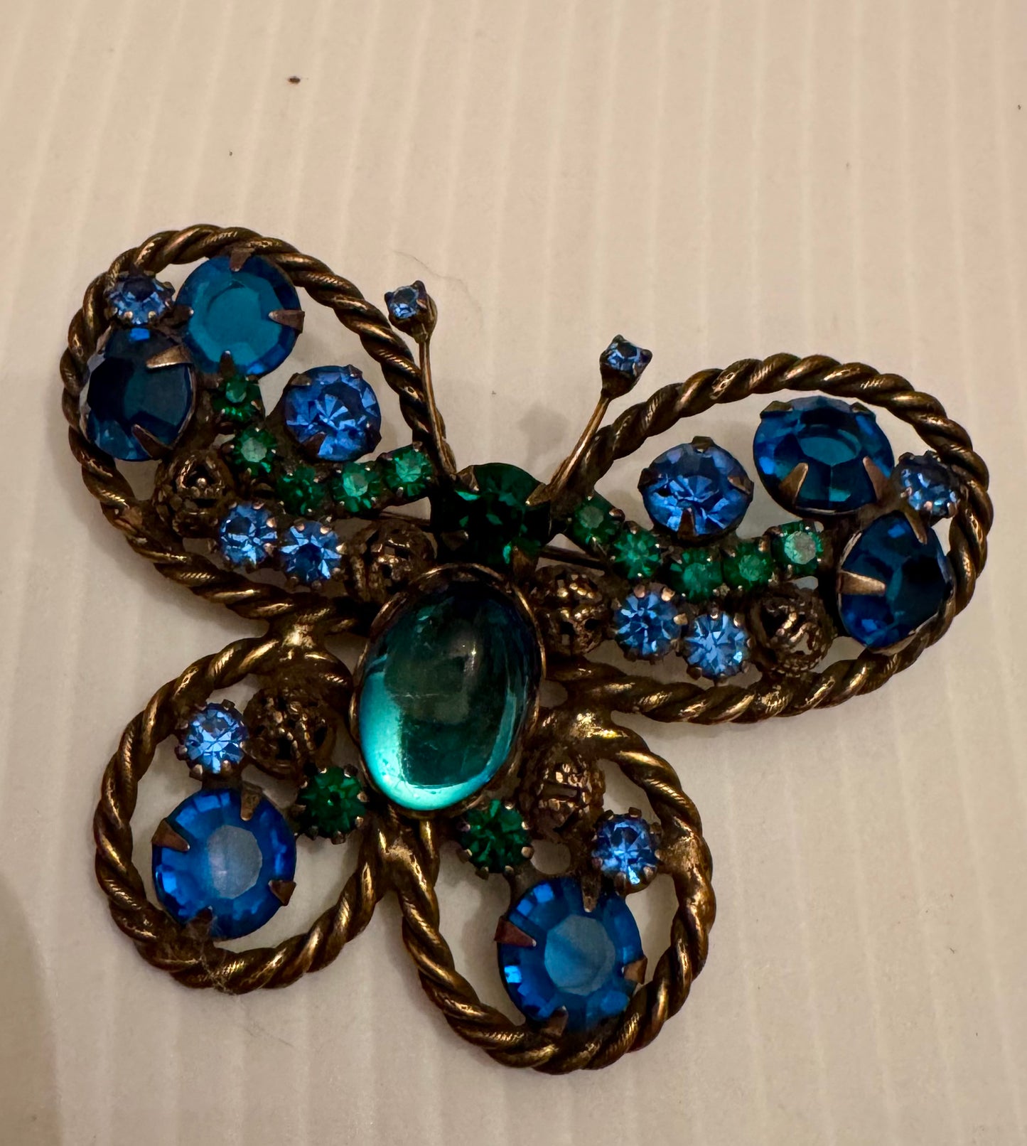 Beautiful 1960s butterfly blue rhinestone brooch