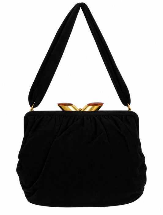 Beautiful 1940s black felt and bakelite kiss lock top handle bag. Inside has original mirror,comb and fragrance bottle