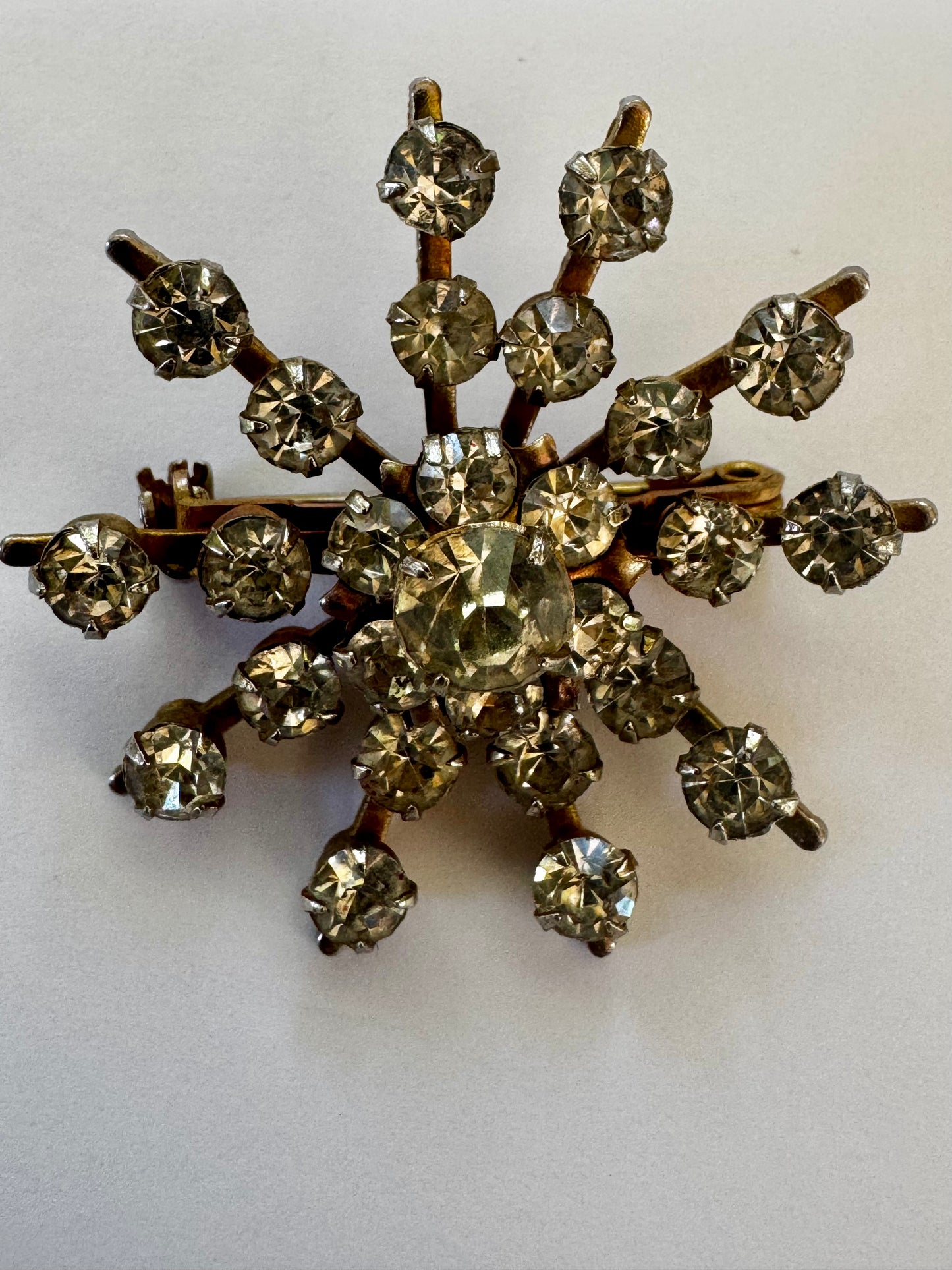 Beautiful prong set crystal rhinestone Starburst brooch