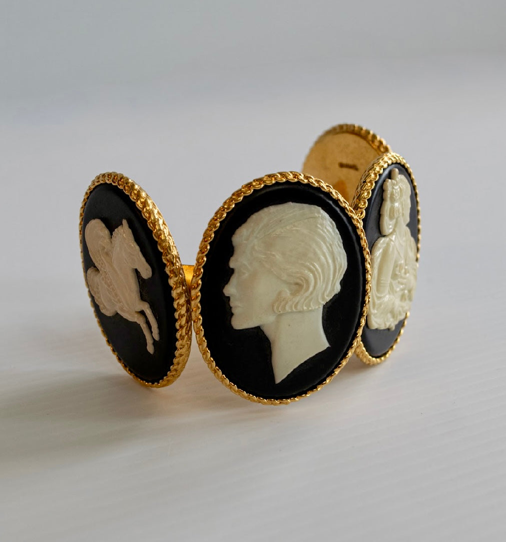 Chanel 1990s carved cameo motif large cuff bracelet with 4-cameo 2" cameo plates featuring a horse, 2 Coco portraits and a renaissance girl.