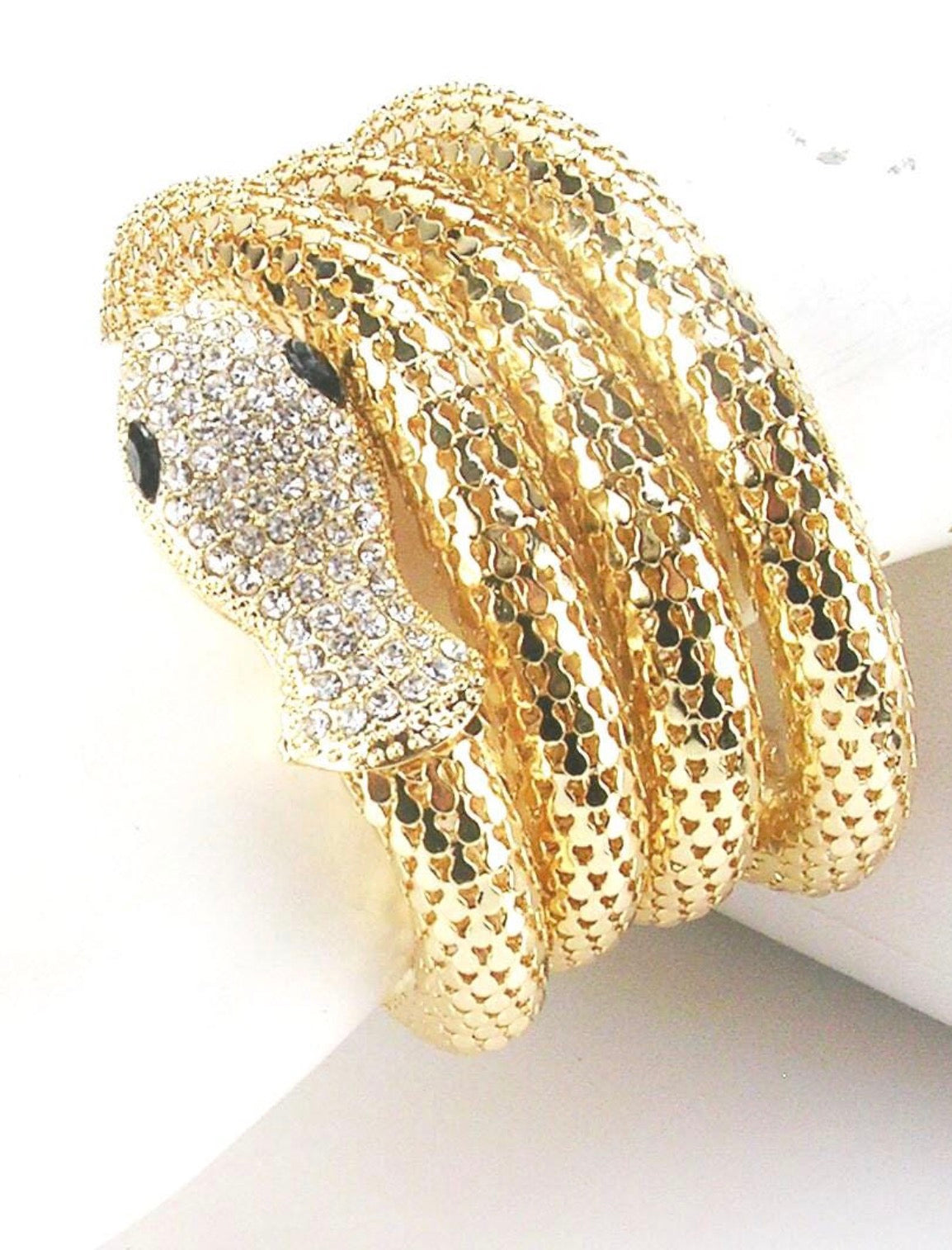 1990s vintage Kenneth J Ln. stretch metal snake bracelet with clear rhinestone head and tail and green rhinestone eyes