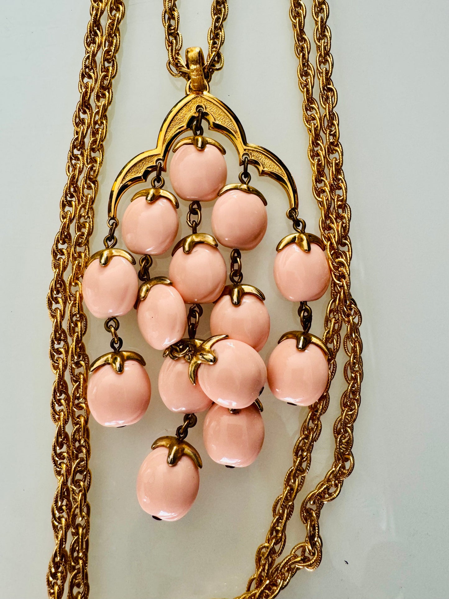 Show stopping vintage Trifari signed pink pendant necklace.