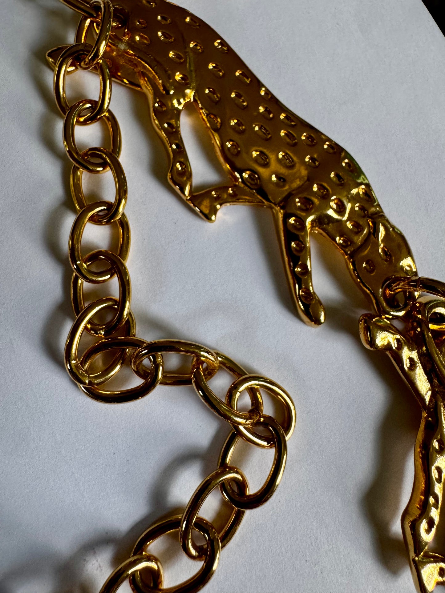 Vintage late 70s panther goldtone belt signed Bold Elegance on each animal