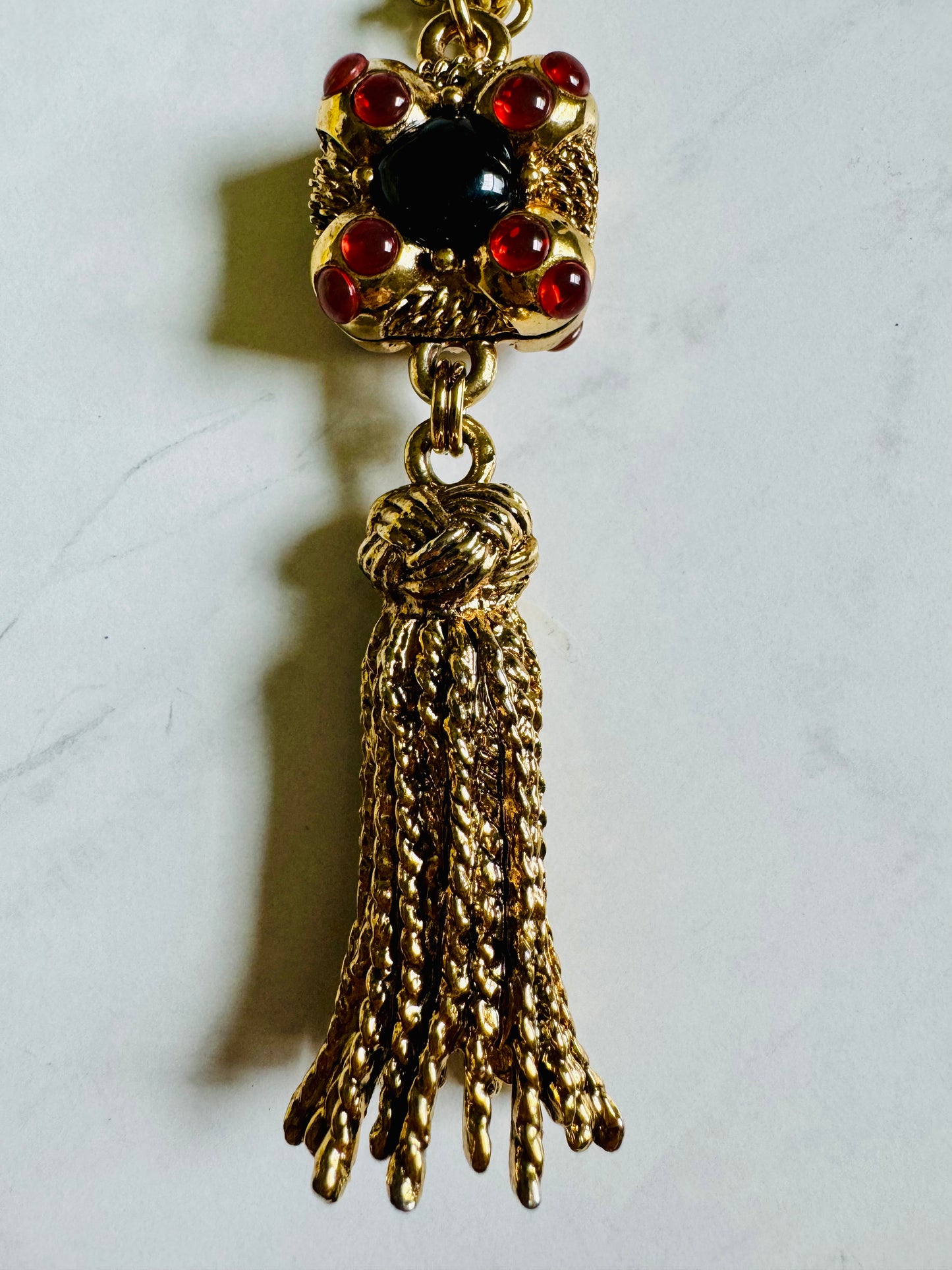 Wow Factor 1980s tassel pendant necklace with black and amber colored stones. Check out the tassel! So cool