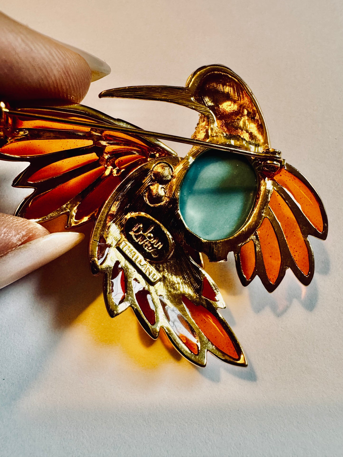 Joan Rivers signed 3-D hummingbird brooch with faux turquoise cabochon and enamel
