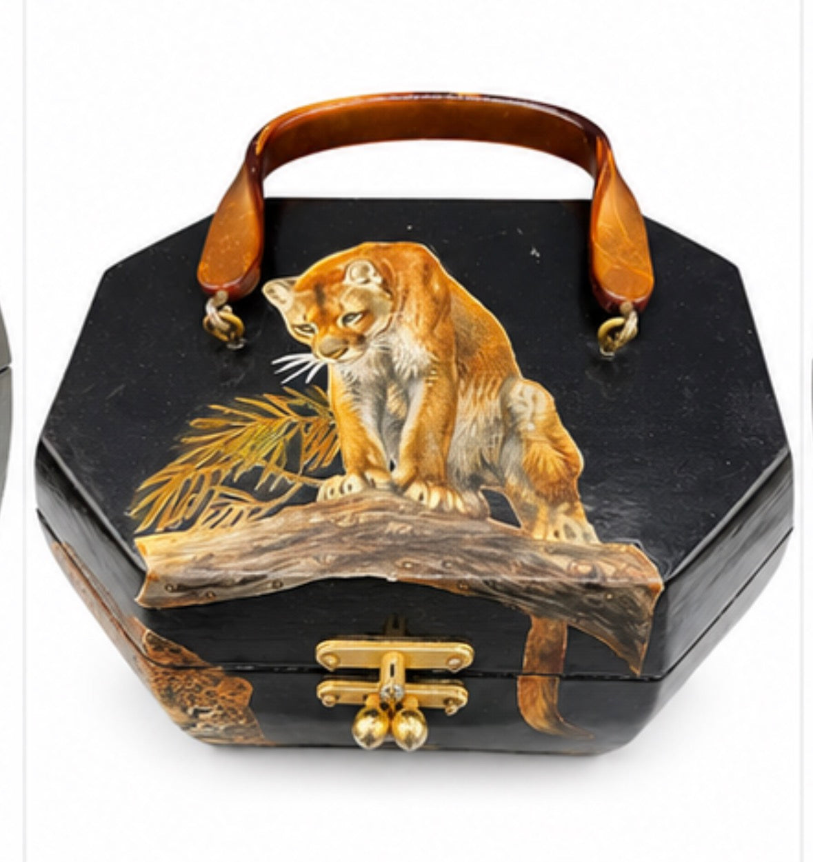 Vintage black lacquer wooden handbag with leopard decoupage and brass clasps. from 60-70s inside bright quirky fabric appropriate for decade.