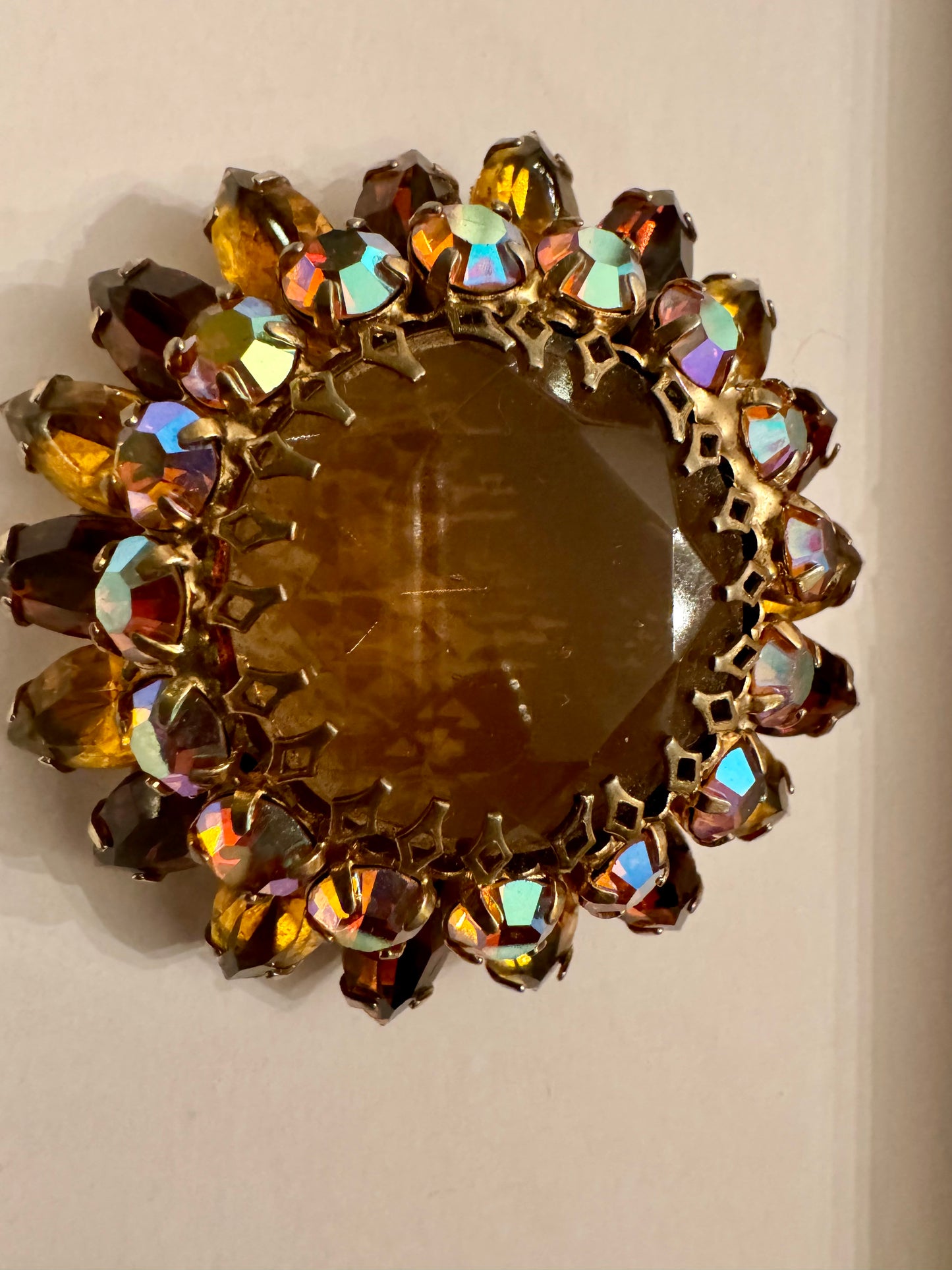 Amber colored rhinestone brooch