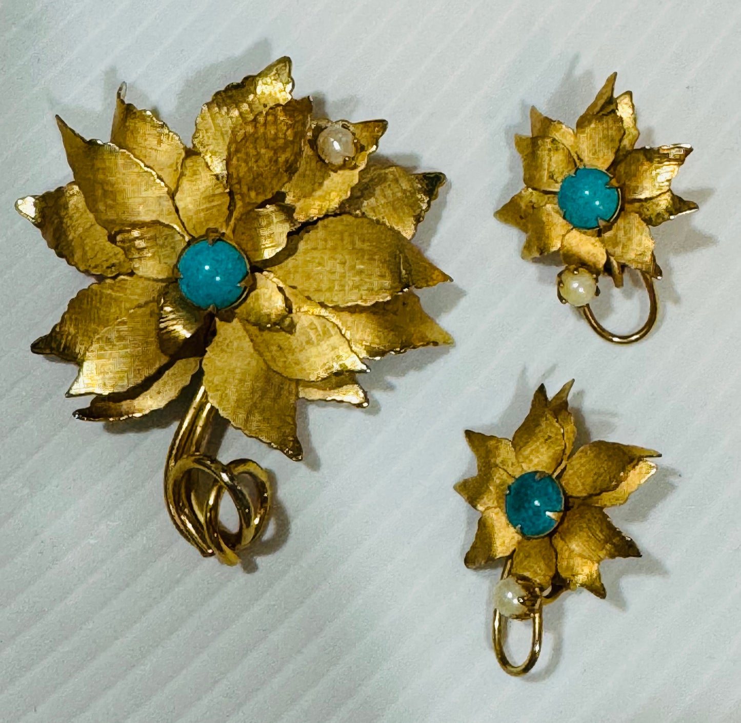 Gorgeous 1940s signed STAR brooch and matching clip on earrings. Sold as a set.