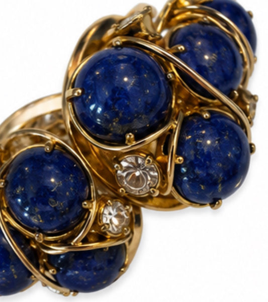 Gorgeous 1940s signed Hattie Carnagie gold plate clamper bracelet with lapis cabochons and rhinestones
