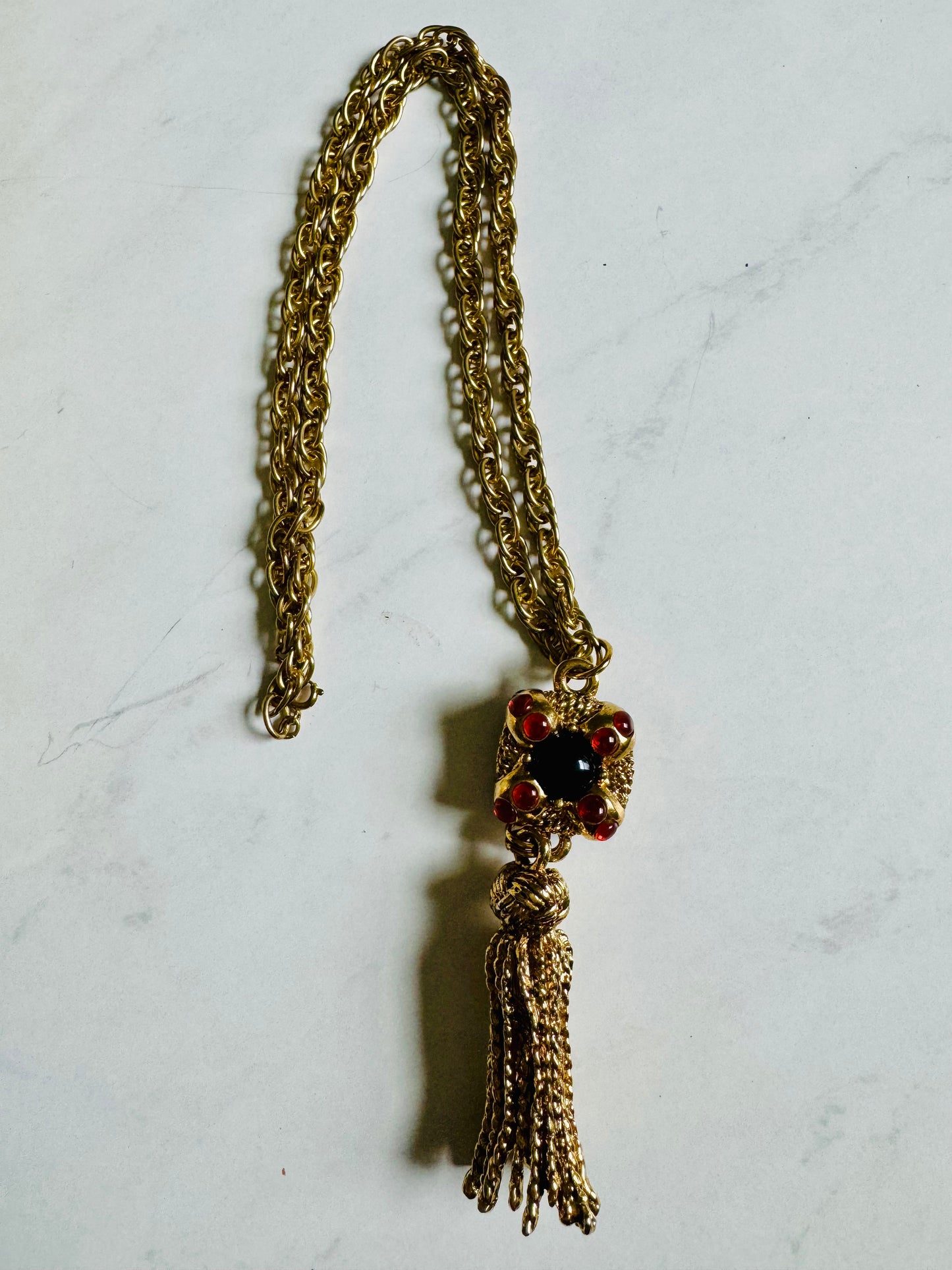 Wow Factor 1980s tassel pendant necklace with black and amber colored stones. Check out the tassel! So cool