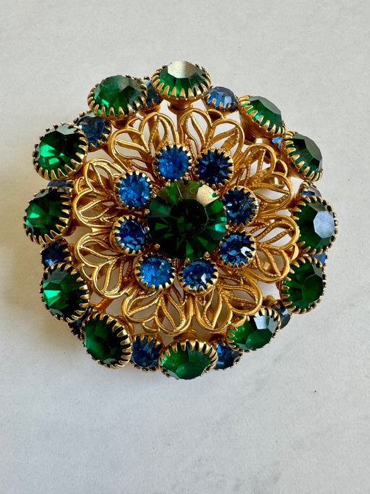 Gorgeous gold tone with green and blue rhinestones brooch