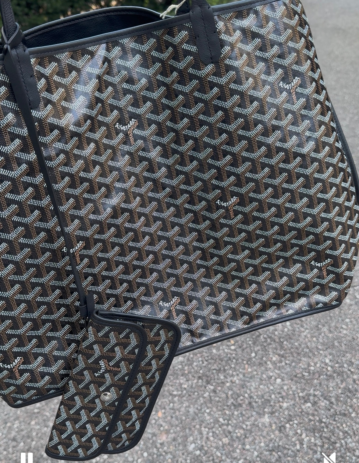 Goyard Goyardine Reversible Anjou GM Tote in black Goyardine canvas with interior pouch. Guaranteed authentic.