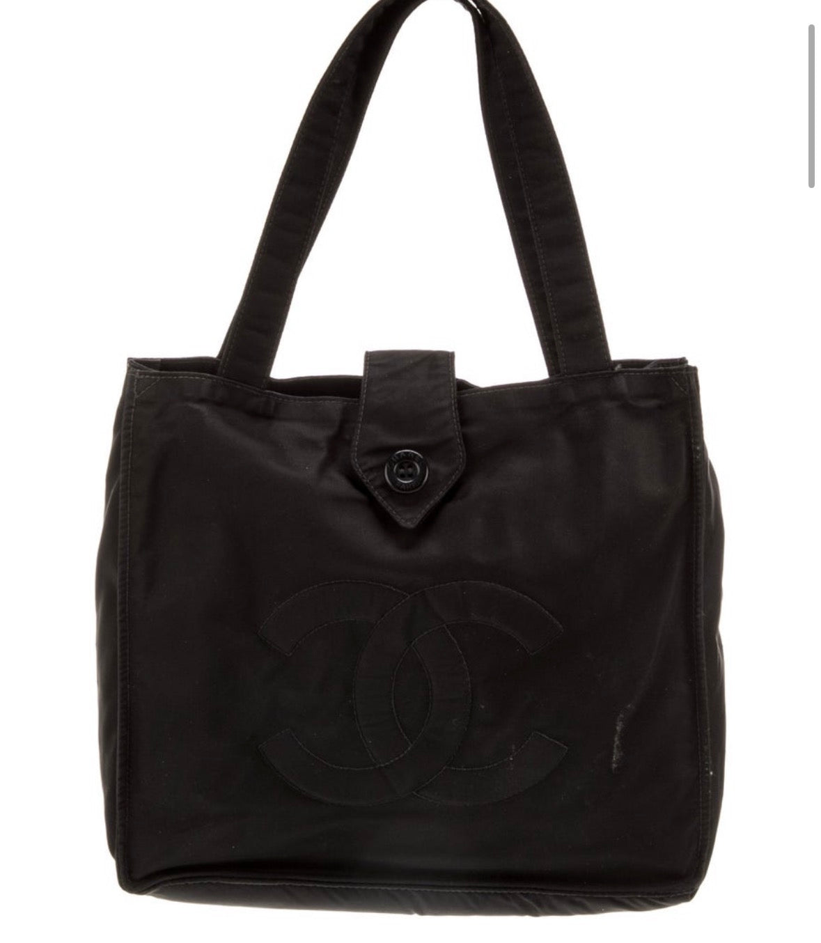 Early 2000 Karl  Lagerfeld era Chanel nylon black tote. See pictures for slight pull on front