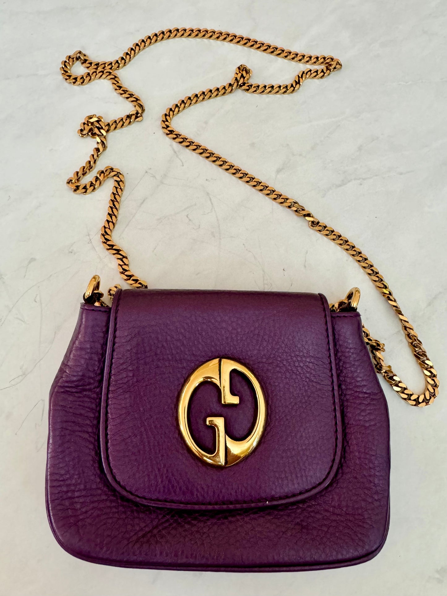 Fabulous mini Gucci crossbody in purple leather with gold tone hardware