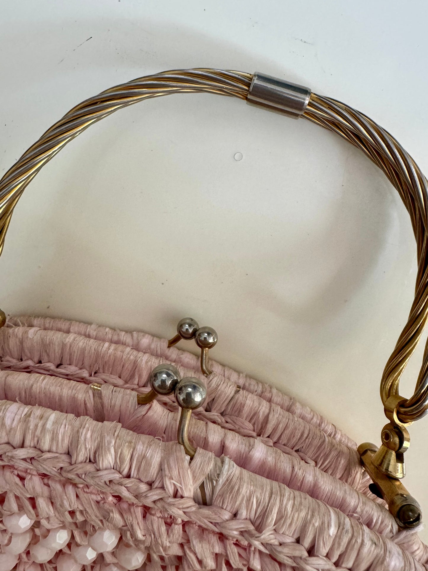 1960s vintage raffia light pink double sided handbag with unique gold hardware