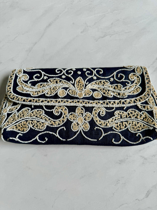Made in France beaded ivory and white clutch on navy fabric