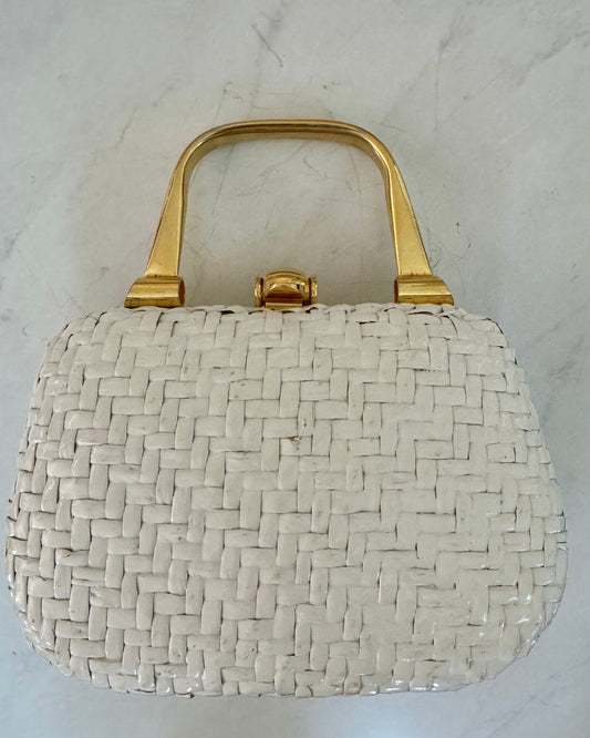 1950s white wicker bag with gold tone hardware