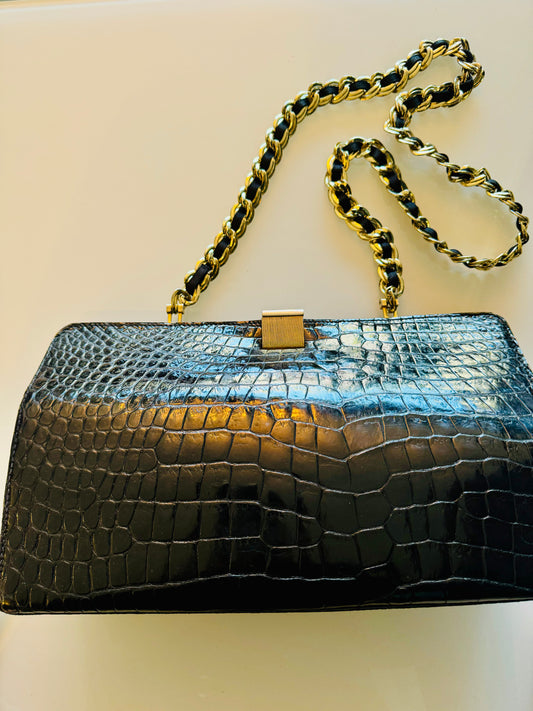 Jumbo 1950s black Alligator shoulder bag from Saks Fifth Avenue. Built in change purse and gorgeous grograin and gold tone chain