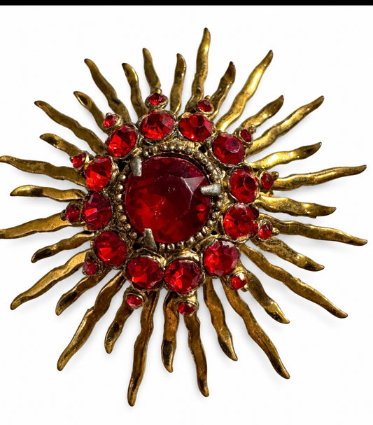 1970s starburst brooch with red rhinestone brooch