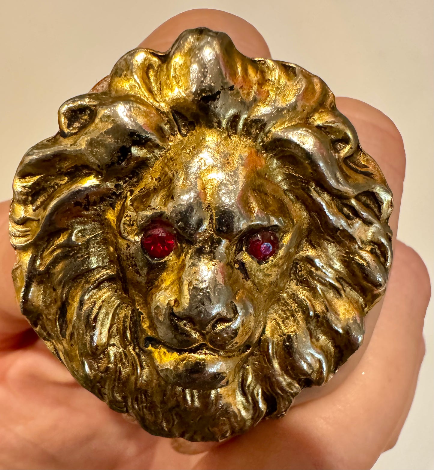 Unique vintage goldtone lion head ring with red rhinestone eyes