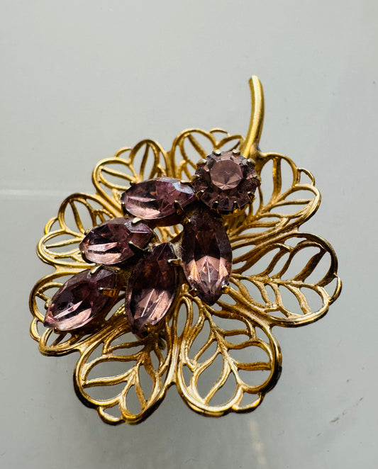 Mini gold tone filagree with flower brooch with light amethyst rhinestones