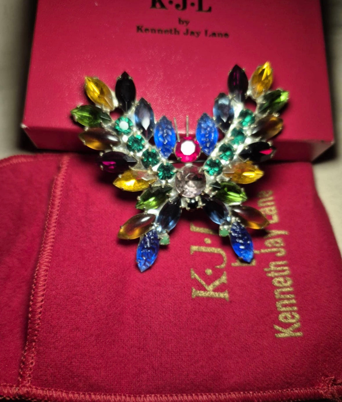 1960s vintage Kenneth Jay Lane jumbo butterfly brooch with prong set rhinestones. comes with original box and dust bag.