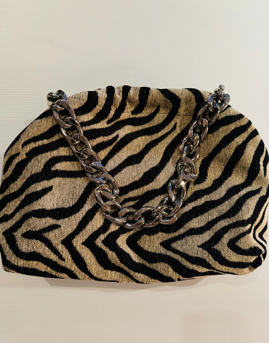 Exclusive Limited Edition Vavra New York black and beige zebra woven chenille . Converts from clutch to shoulder strap with chunky chain shown. Black lining with interior pocket.