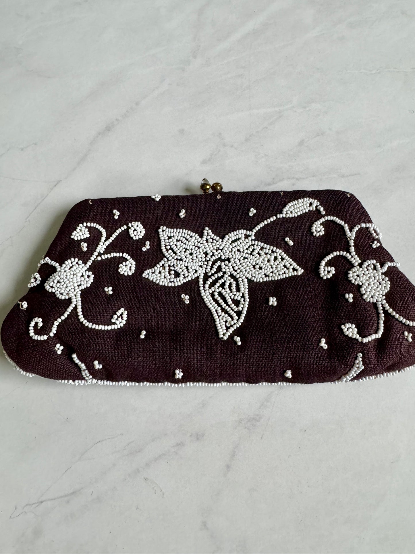 Small black silk clutch with white beading