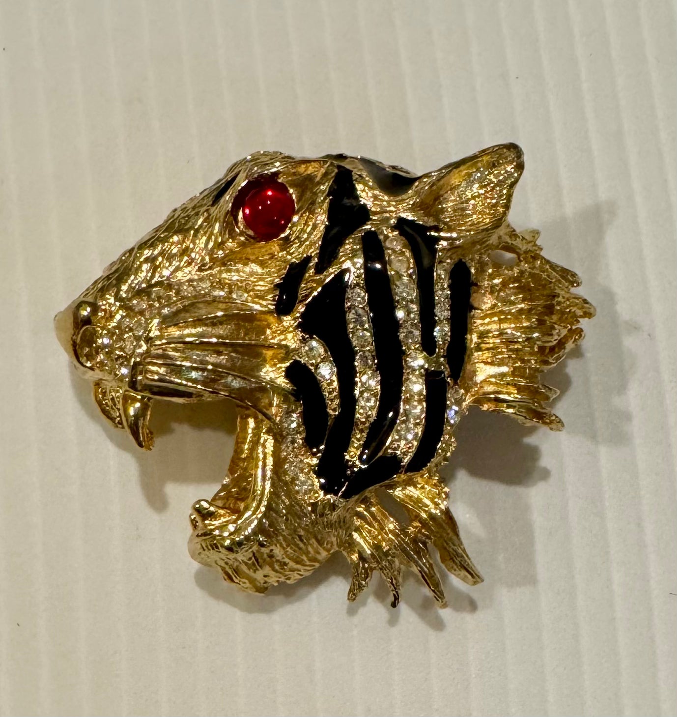 1980s jumbo tiger head brooch with enamel and rhinestones