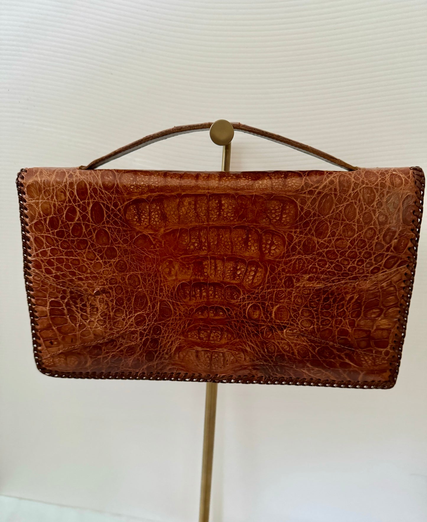 1950s tan skin clutch with top strap