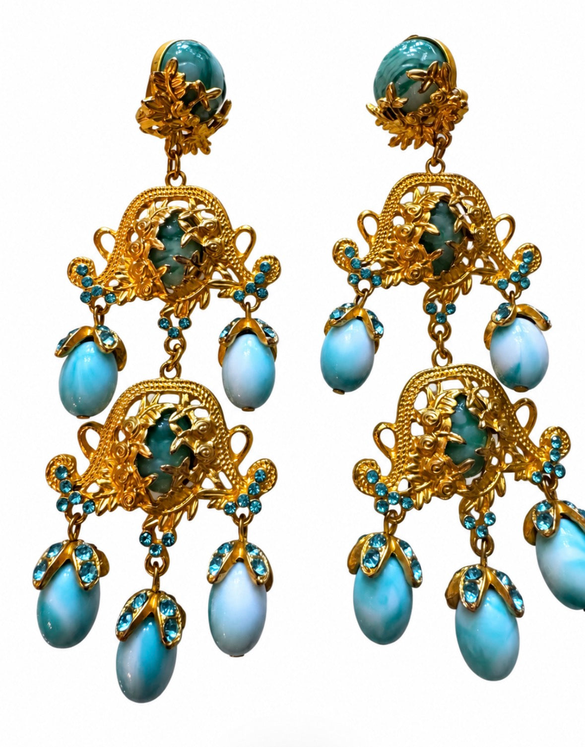 1980s gorgeous dangle clip on earrings with light turquoise colored stones on a gold tone filigree