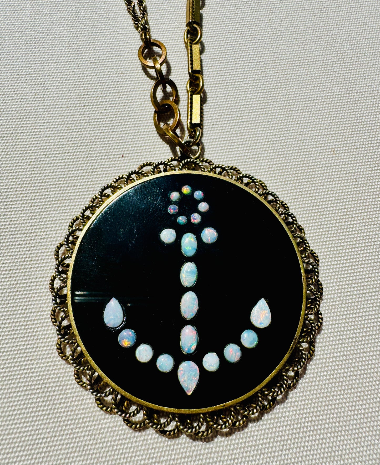 Gorgeous vintage nautical pendant with mother of pearl anchor on black onyx.