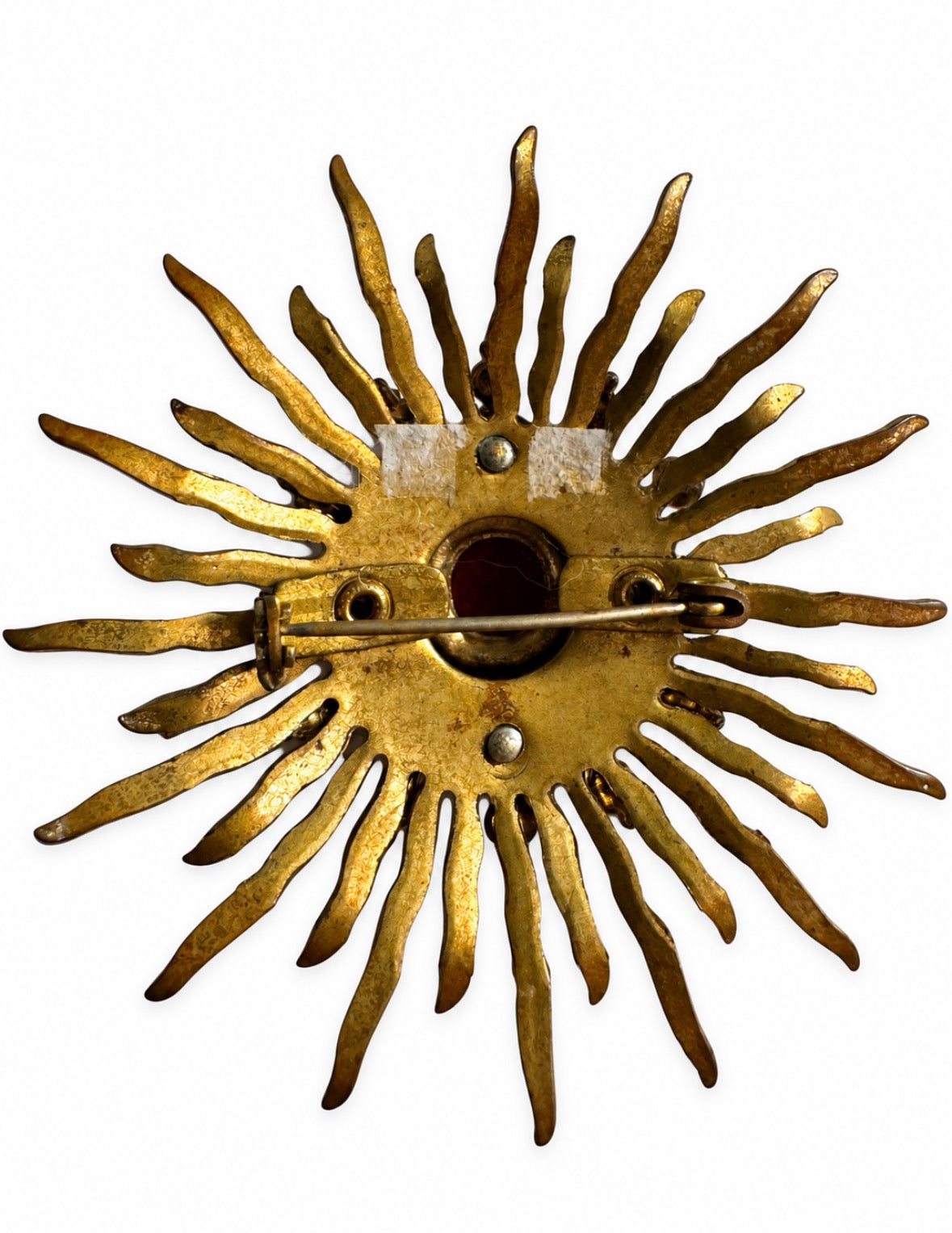 1970s starburst brooch with red rhinestone brooch