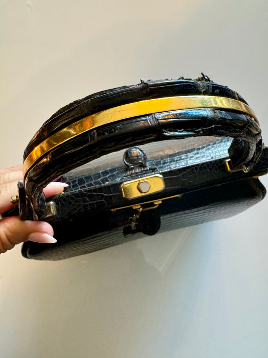 Vintage Lederer made in France black alligator bag with gold hardware late 1940s. Included original mirror in leather case