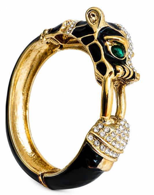 Vintage clamper panther bracelet with black enamel and emerald colored eyes