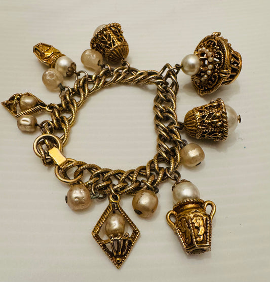 Fabulous 1950s gold tone charm bracelet