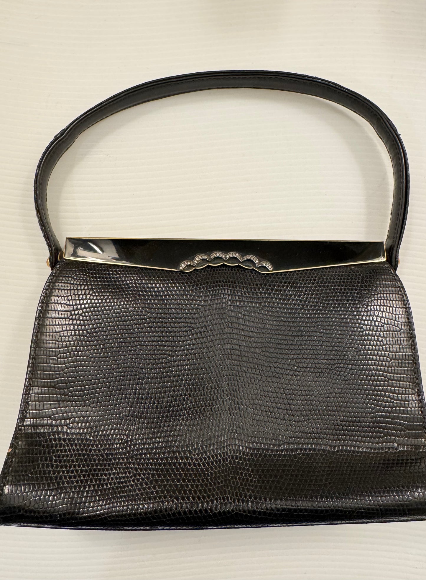 Gorgeous Black 1940s lizard top hand bag with enamel hardware. Made for Saks Fifth Avenue in France